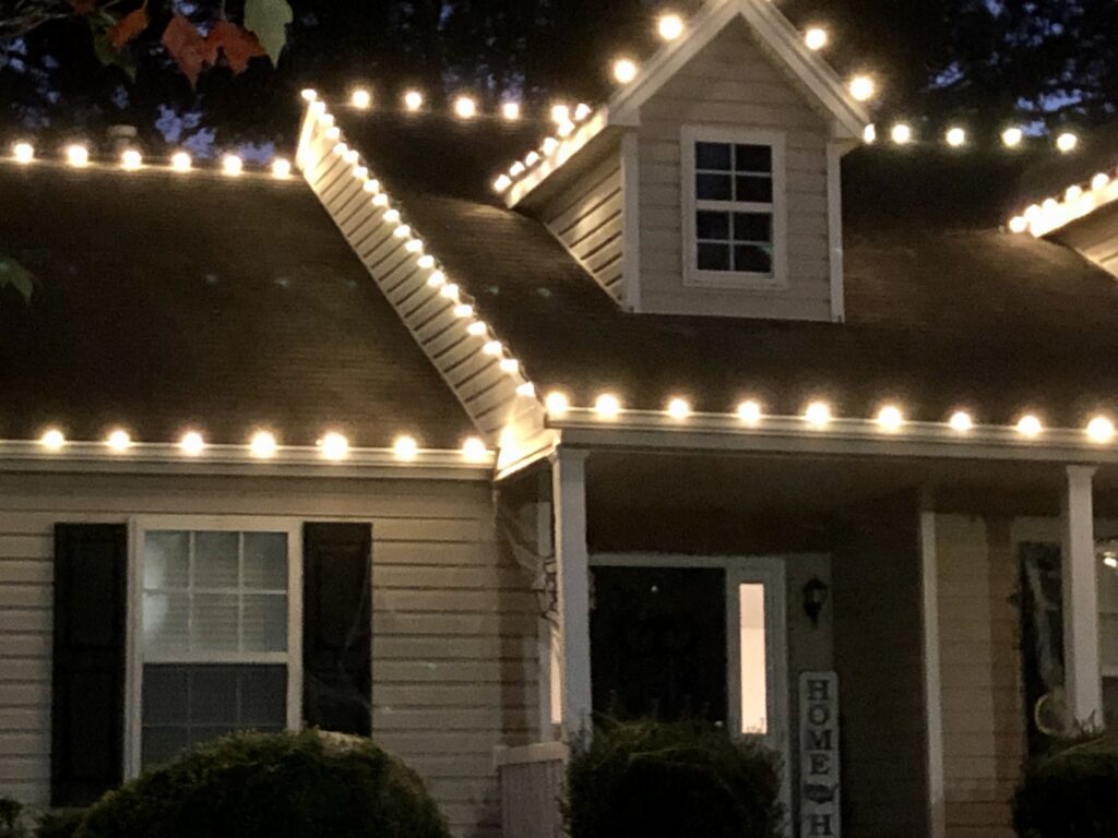 A person would have had to walk carefully on their roof to hang these Christmas lights 