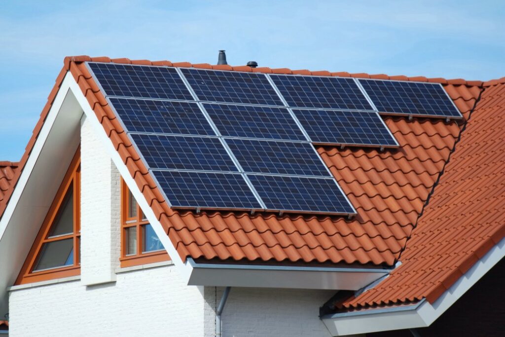 Solar panels against a clay tile roof 