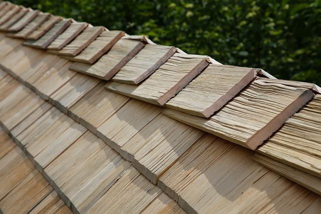 An image showing Wood shingles which are good roofing materials in Phoenix, AZ